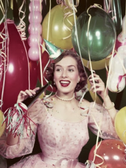 h-armstrong-roberts-1950s-happy-woman-in-party-dress-at-new-years-eve-celebration_i-G-61-6157-ONXG100Z.jpg